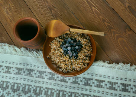 Tattaripuuro - Finnish version of buckwheat porridge with blueberriesの写真素材