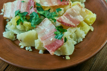 Gwledd y Cybydd - Welsh Misers Feast, traditional Welsh recipe for a classic, frugal supper of potatoes, onions and bacon rashers boiledの写真素材