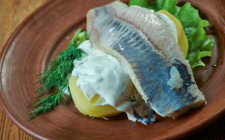 Herring with dill and Scandinavian mustard potato saladの写真素材