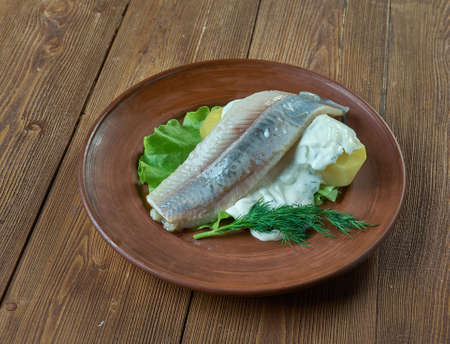 Herring with dill and Scandinavian mustard potato saladの写真素材