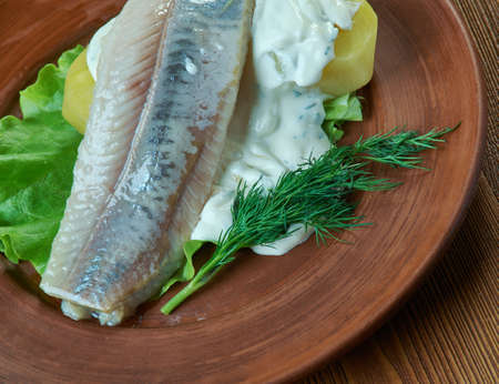 Herring with dill and Scandinavian mustard potato saladの写真素材