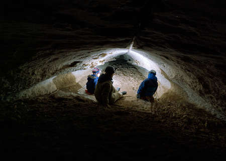 Family speleotourists. Cave in the Pinega region .Arhangelsk region