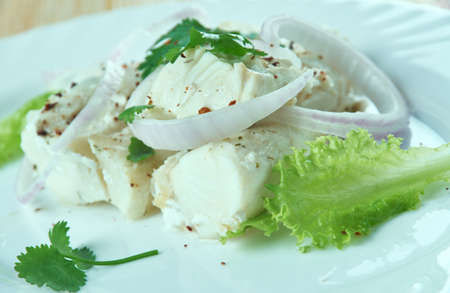 Sea bass ceviche on a White Plate.の写真素材