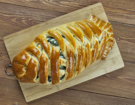 Kalakukko -  traditional food from the Finnish region of Savonia made from fish baked inside a loaf of bread.の写真素材