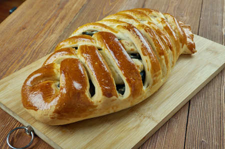 Kalakukko -  traditional food from the Finnish region of Savonia made from fish baked inside a loaf of bread.の写真素材