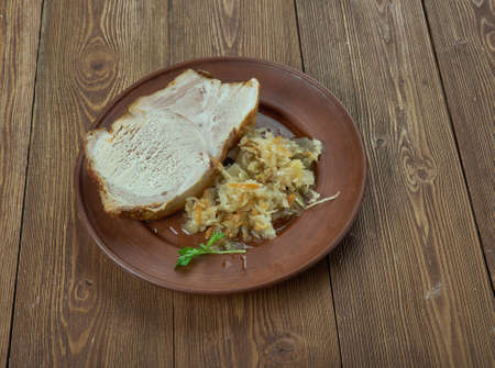 Frankfurter Rippchen - hot cured cutlet with sauerkraut,traditional dish served in and around...