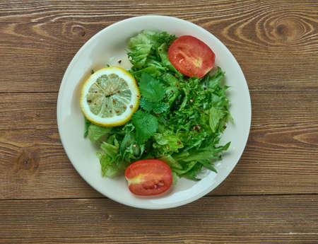 Turp otu salad - Spring salad from leaves of wild radish with garlic. Turkish cuisineの写真素材
