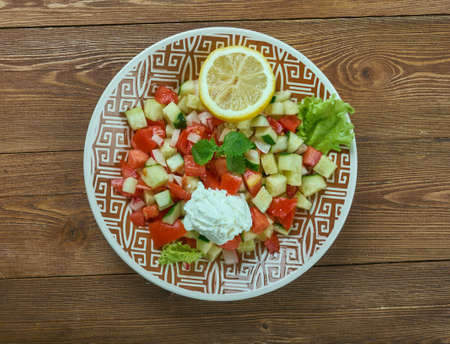 Choban salatasi - Shepherd's Salad, Turkish salad consisting of finely chopped tomatoes , cucumbers,...