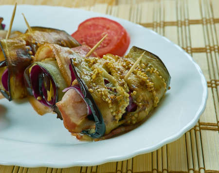 Italian Eggplant wraps with prosciutto and mozzarellaの写真素材