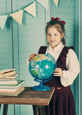 Happy little girl  with books , vintage conceptの写真素材