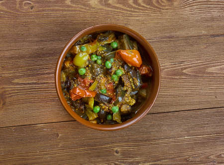 Bulgarian guvec , Dish of stewed vegetables and greens, close upの写真素材