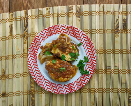 Kesari Fish Tikka - Tandoori baked fish chunks marinated with yoghurt, saffron and spices.の写真素材