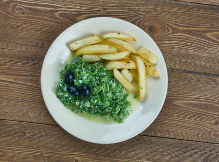 Ndole - Cameroonian dish consisting of stewed nuts, ndoleh and fish or beef, African cuisineの写真素材