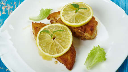 Lemon Chicken Romano - skinless chicken breasts with lemon butter sauceの写真素材