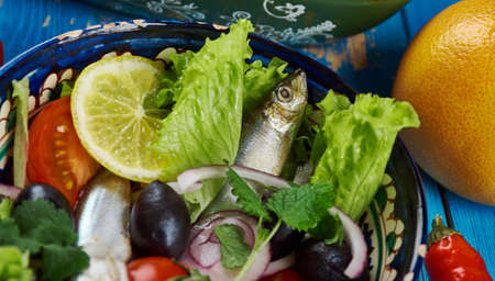 Maghreb cuisine . Algerian Salad with Anchovies close up