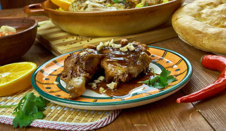 Arabian cuisine - Fasanjoon, Chicken in Pomegranate and Walnut Sauce, Top view.