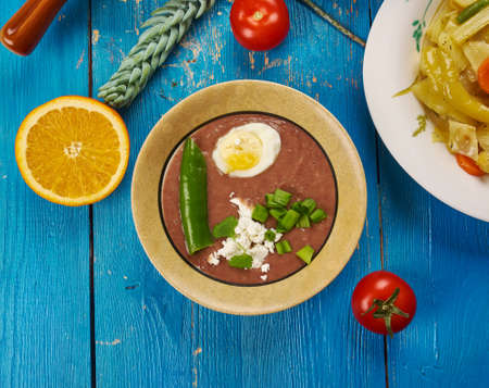  East African cuisine - Ethiopian Ful Medames , Traditional assorted African  dishes, Top view.