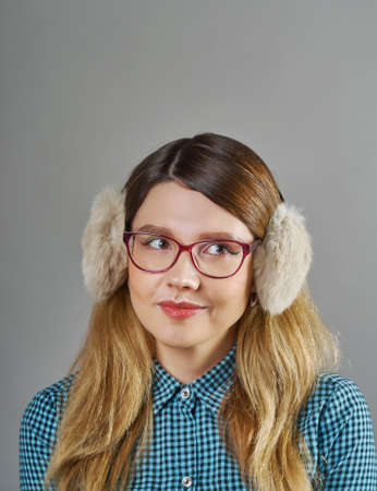 young pretty fair-haired teenage girl in glasses emotional posing ,  lifestyle people concept