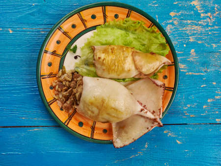 Lulas Recheadas - Portuguese dish, stuffed squid with bacon and riceの写真素材