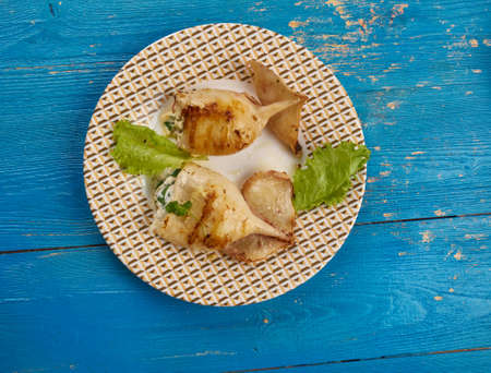 Gemisto Kalamari -  Greek dish, stuffed squid with feta and cilantro