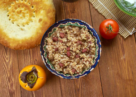 Tajik cuisine, kashk - soup from cereals and legumes, Traditional assorted Tajik  dishes, Top view.の写真素材