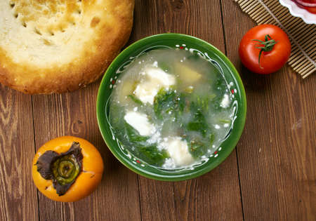 Tajik cuisine,oshi siyolaf, spicy and sour greens soup, Traditional assorted Tajik  dishes, Top view.の写真素材