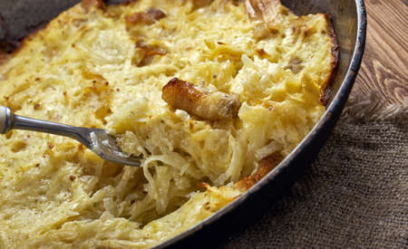 Potato babka - made from grated potatoes, eggs, onions, and pieces of smoked, boiled or fried bacon.の写真素材