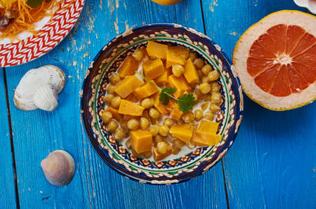 Moroccan cuisine, Chickpea Squash Tagine, Traditional assorted Moroccodishes, Top view.の写真素材