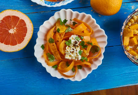 Moroccan cuisine, Harissa Carrot salad with Feta cheese, Traditional assorted Moroccodishes, Top view.の写真素材