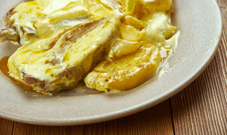 Slow Cooker Dijon Pork Chops - Pork chops and potatoes .の写真素材