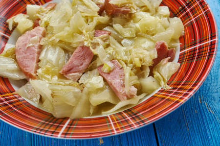Southern Fried Cabbage - Cooked Country Style .Cabbage is fried with onion and bacon in this simple quick side dish.の写真素材