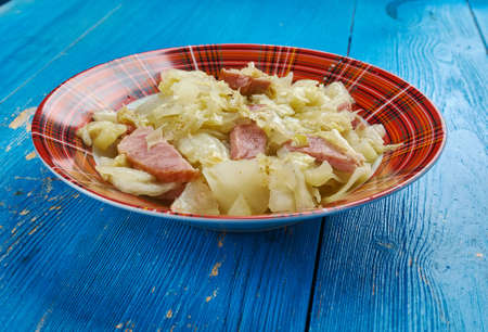 Southern Fried Cabbage - Cooked Country Style .Cabbage is fried with onion and bacon in this simple...