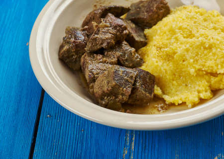 Tocana Pomana porcului - Romanian pork liver stew with corn porridgeの写真素材