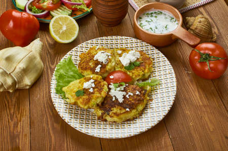 Kolokythokeftees, zucchini tots, Greek  cuisine , Traditional assorted dishes, Top view.の写真素材