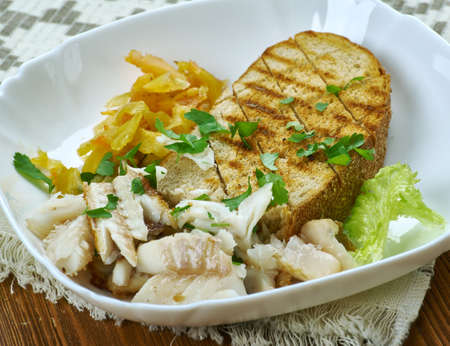 Torricado - pecialty from the Ribatejo region of Portugal, of bread toasted erved mainly as a side dish to grilled salt codの写真素材