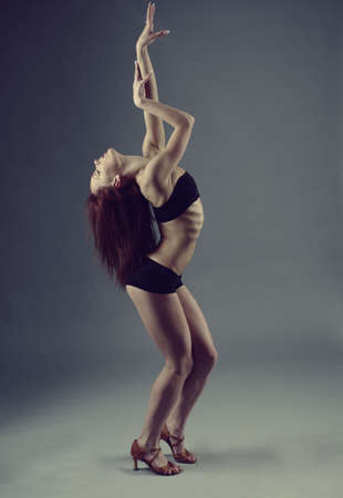 modern style dancer posing on  gray background の写真素材