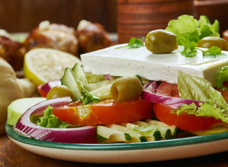 Greek Horiatiki - authentic Greek Salad,  cuisine , Traditional assorted dishes, Top view.の写真素材