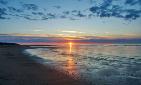 Sunset White Sea, Russia .Sandy shore of the south coastの写真素材