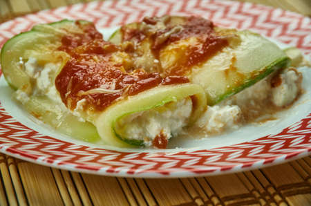 Zucchini Ricotta Manicotti , combine ricotta cheese, spinach,  mozzarella cheese, parmesan cheese, parsley, salt, pepper, and garlicの写真素材