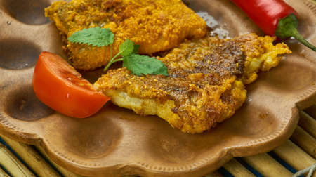 Chettinad Fish Fry - Chettinad cuisine , Fish fillet marinated in chettinad style masala and then shallow fried in oilの写真素材