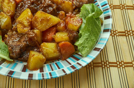 Pork Estofado -  Filipino sweet and salty pork stew made with soy sauce, vinegar, onions, garlic,...