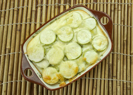 Cheesy Squash Casserole , ts richness from Parmesan, cheddar ,  sour cream, summer squas/の写真素材