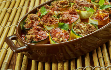 Zucchini Enchilada Roll-Ups, Spread chicken mixture on to a slice of zucchini and roll into a tight spiralの写真素材