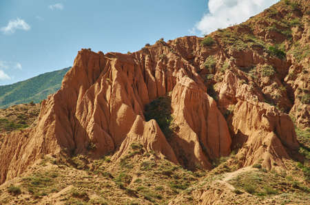 Fairy Tale Canyon, rock formations on the Issyk-Kul lake. Kyrgyzstan.Central Asia