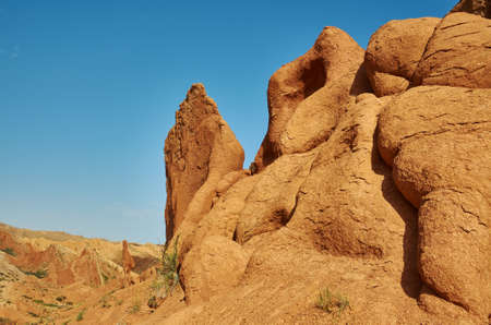 Fairy Tale Canyon, rock formations on the Issyk-Kul lake. Kyrgyzstan.Central Asia