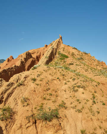 Fairy Tale Canyon, rock formations on the Issyk-Kul lake. Kyrgyzstan.Central Asia
