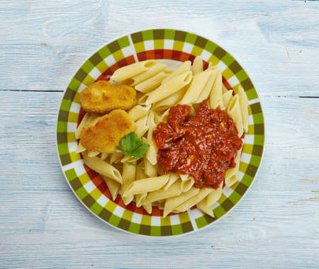 Nuggets with pasta and tomato sauce, Italian cuisineの写真素材