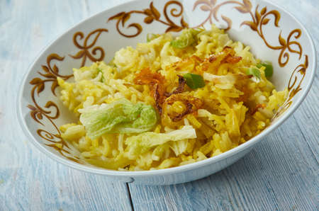 Zafrani Pulao - Basmati rice cooked in a sweet and rich blend of spices and nuts.