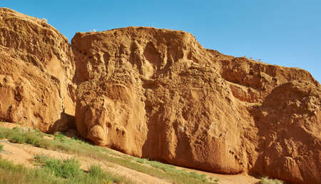 Fairy Tale Canyon, rock formations on the Issyk-Kul lake. Kyrgyzstan.Central Asia