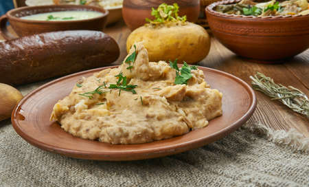 Traditional Scottish Stovies,  dish based on potatoes and meat, Scottish cuisine, Traditional assorted dishes, Top view.の写真素材